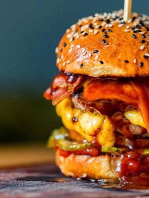 close-up-tasty-burger-with-minced-meat-served-on-t-2024-10-17-05-49-54-utc.jpg