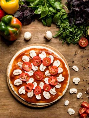 top-view-of-raw-homemade-pizza-and-fresh-ingredien-2024-11-19-08-38-36-utc_11zon.jpg